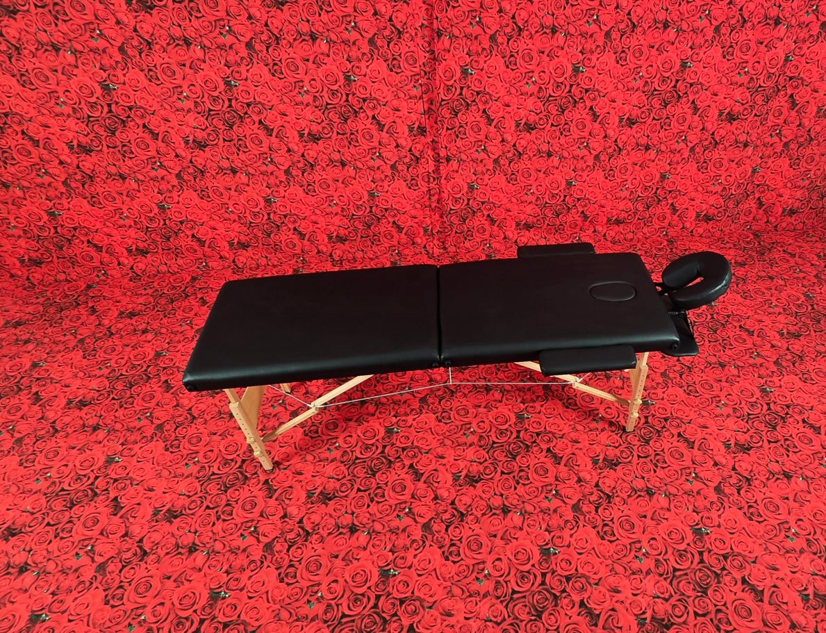 Camilla de masajes plegable en ciclorama